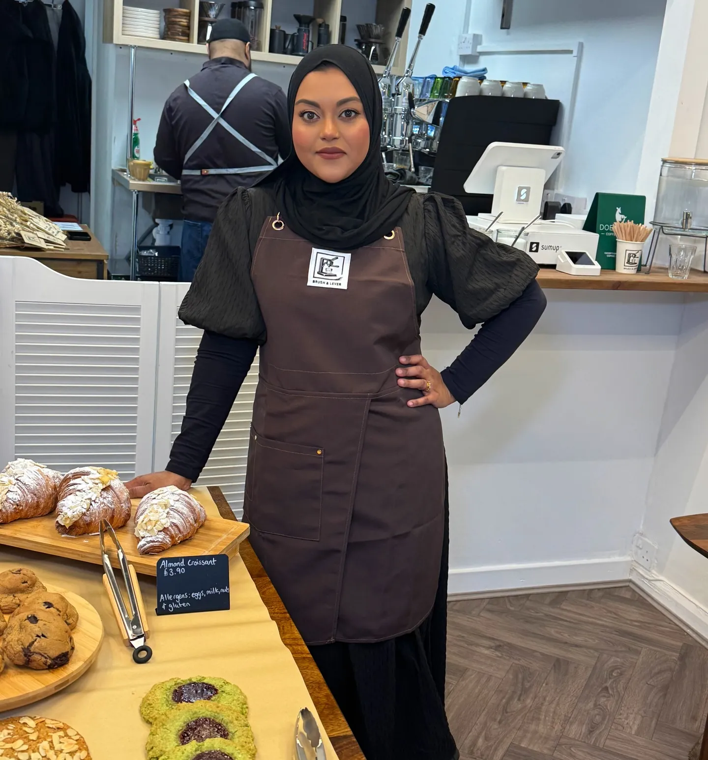 A barista at the counter