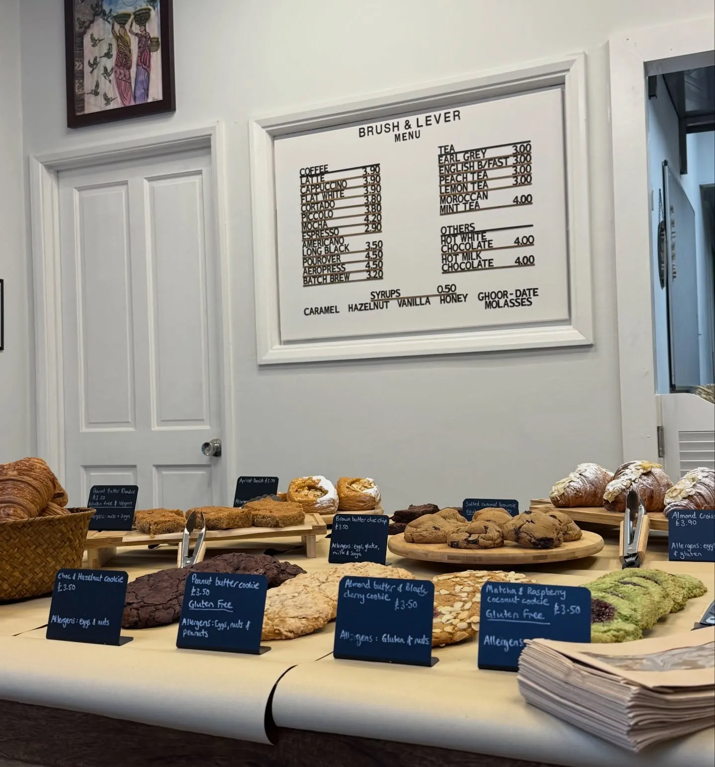 The counter and the Brush & Lever menu board